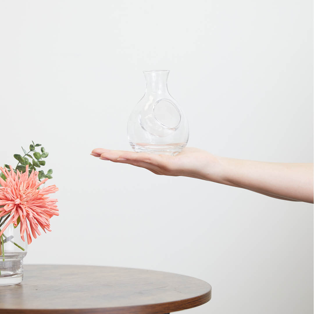Pocket Glass Carafe, on a hand