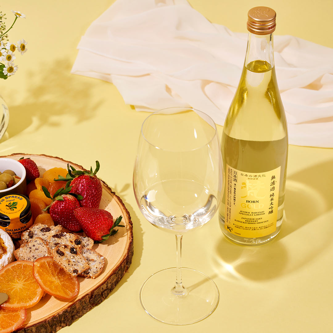 Born “Gold” Junmai Daiginjo with a wine glass, served with fruits