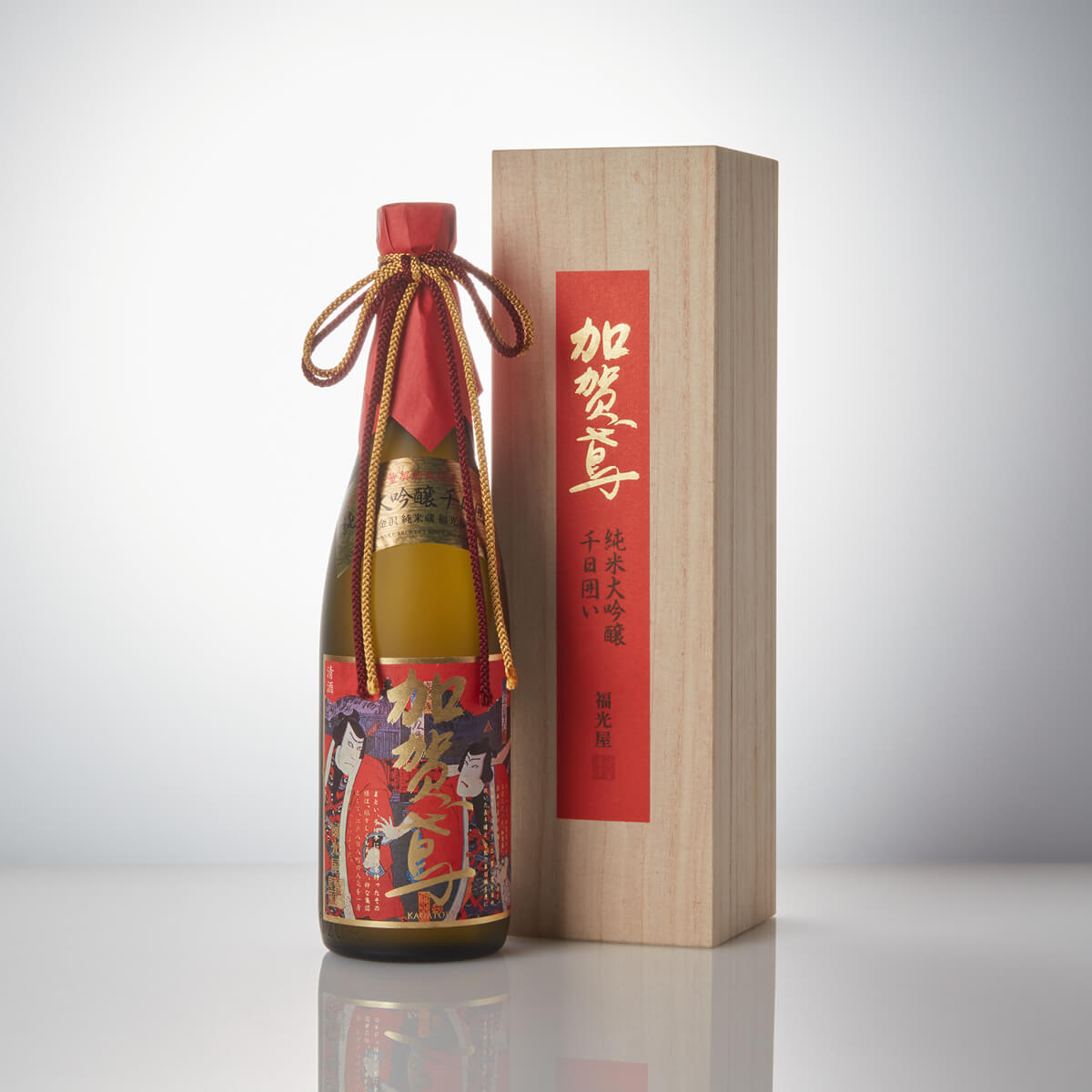 Kagatobi “Sennichi Kakoi” Junmai Daiginjo, standing in front of a product box