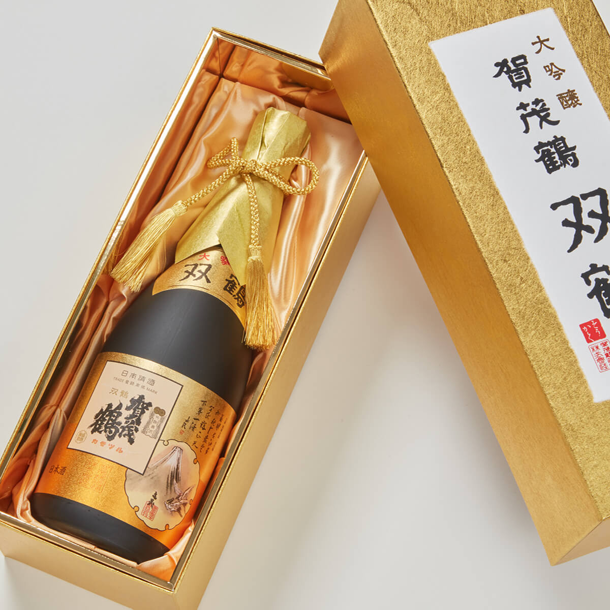 Kamotsuru “Sokaku” Daiginjo,  lying inside a product box