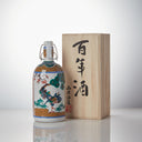 Nishide “100 Year” Junmai Daiginjo, standing in front of a product box