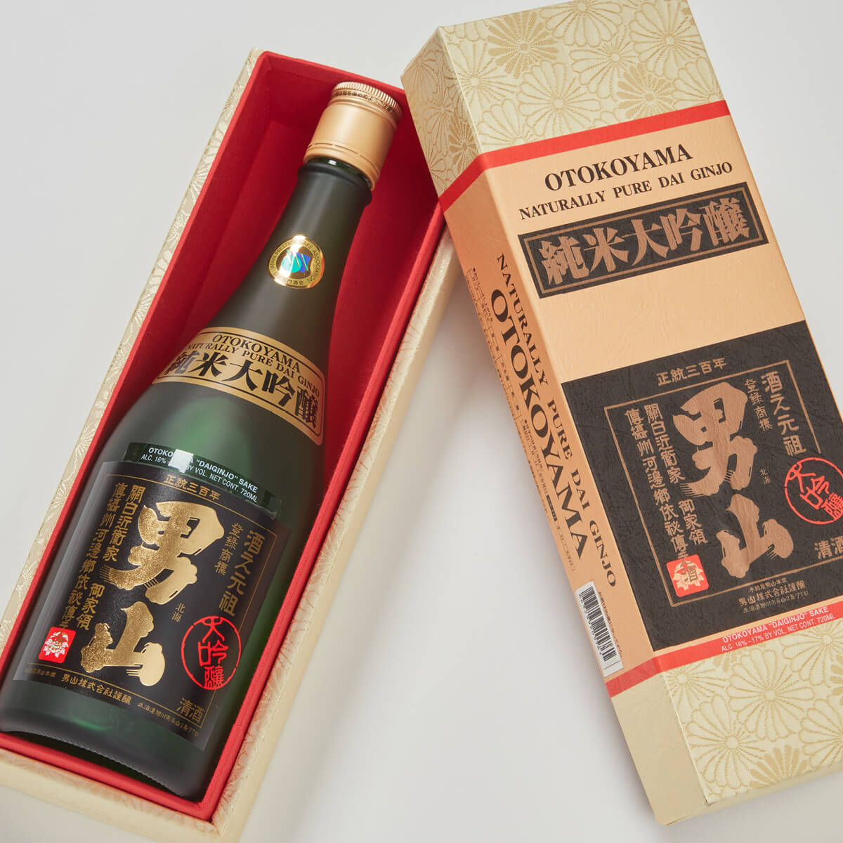 Otokoyama “Junmai Daiginjo,” lying inside a product box