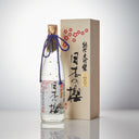 Tatsuriki “Nihon no Sakura Gold” Junmai Daiginjo, standing in front of a product box