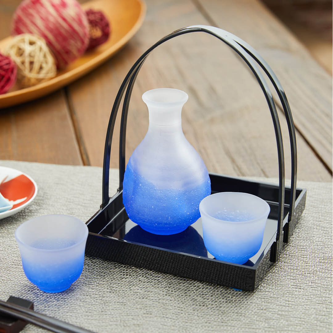 “Fubuki” Sake Set With Handbasket (Blue), on a table