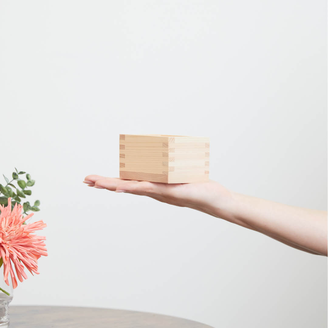 Hinoki Masu Small, on a hand