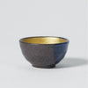 “Mino no Takumi” Black Sakazuki Cup With Blue Drip Glaze and Gold Interior, upward angled view Thumbnail