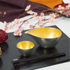 “Nousaku” Tin Gold Sake Set, on a table Thumbnail