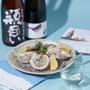 Dewanoyuki “Bingakoi” Junmai Daiginjo and Niwa no Uguisu “50” Junmai Daiginjo with a clear glass, served with oyster Thumbnail
