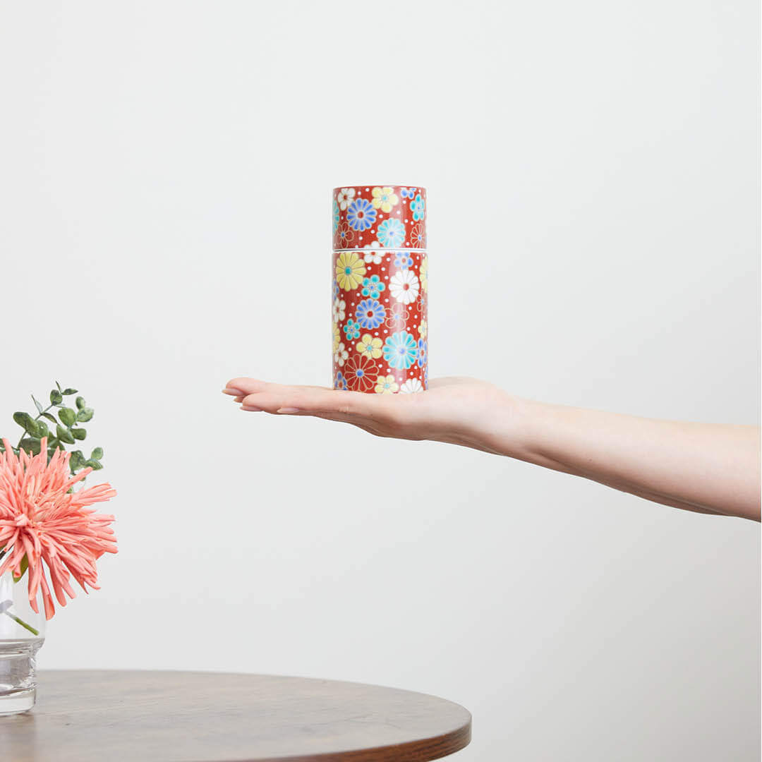 “Seikou” Sakazutsu Sake Set (Umekiku red), on a hand