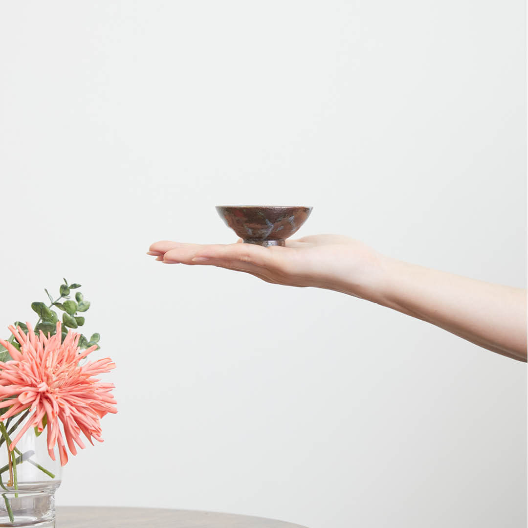 Sorisakazuki Cup With White Swirl, on a hand